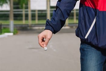 Man Drops Litter Shutterstock